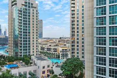an aerial view of a city with tall buildings at FIRST CLASS 1BR Breathtaking Downtown View in Dubai