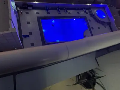 a computer monitor sitting on top of a desk at Beautiful Studio Apartment in Dubai
