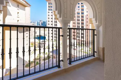 a balcony with a view of the city at Al Andalus Tower F, Cadiz JGE - 3BR Apartment - Allsopp & Allsopp in Dubai
