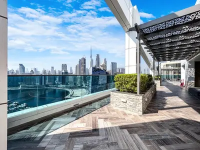 a balcony of a building with a view of the city at Nicely Furnished Home in the Heart of Business Bay in Dubai