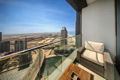 a balcony of a building with a view of a city at Stylish 1BR apartment in Address Beach Residence in Dubai