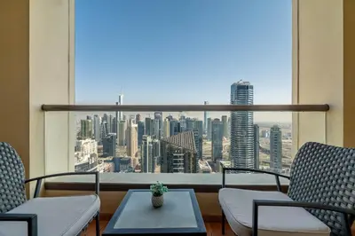 a room with a view of a city skyline at GuestReady - Beachfront delight in JBR in Dubai