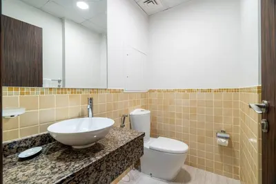a bathroom with a sink and a toilet at GuestReady - Contemporary stay in Dubai Marina in Dubai