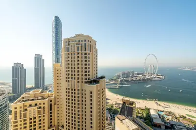 a view of a city with tall buildings and a beach at GuestReady - Contemporary stay in Dubai Marina in Dubai