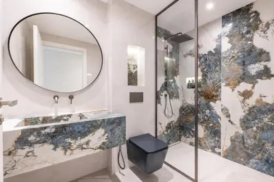 a bathroom with a sink and a mirror at Luxury Coastal Escape - Bright 3BR Apt - La Vie JBR in Dubai