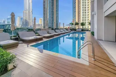 a pool on the roof of a building at Dubai Opera - Luxury 2 Bedroom Apartment - Near Burj Khalifa in Dubai