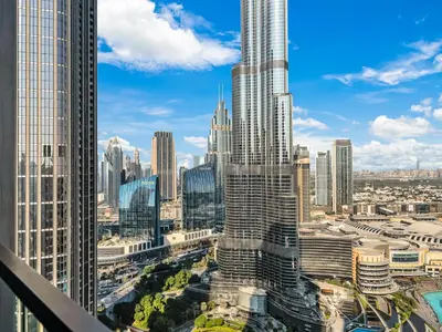 a view of the chicago skyline from the observation deck of a skyscraper at SmartStay at Grande Signature - Burj Khalifa View - 5 min Dubai Mall - Downtown Dubai - Brand New Luxury Apartments in Dubai