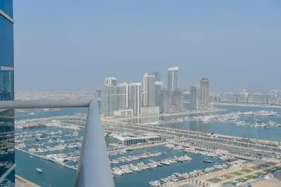 an aerial view of a city with a harbor at Stunning 1BR with Palm Jumeriah View in Marina in Dubai