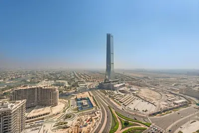 an aerial view of a city with a tall tower at 2-Bedroom Apartment in ME DO RE in Dubai
