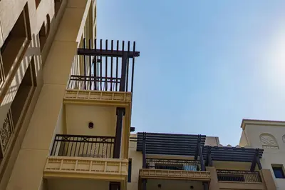 a building with balconies on the side of it at Spacious 4BR in Madinat Jumeirah Living in Dubai
