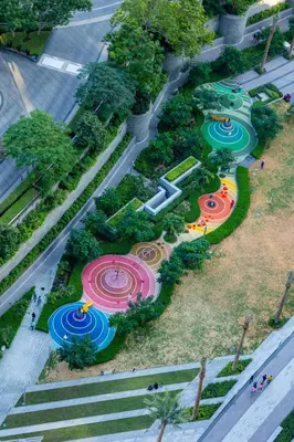 an overhead view of a park with colorful gardens at Luxury 2BR at Address Opera Downtown City View in Dubai