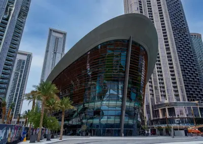 a glass building in a city with tall buildings at Luxury 2BR at Address Opera Downtown City View in Dubai