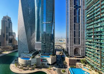 an aerial view of a city with tall buildings at Livbnb - 2BR Apartment with Breathtaking Marina View in Dubai