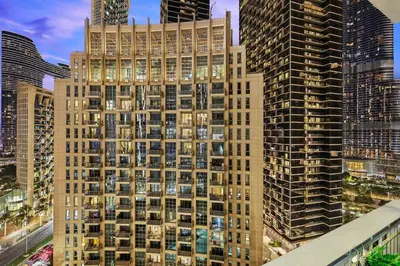 a rendering of a tall building in a city at Burj Khalifa View 2BR Steps from Dubai Mall & Metro in Dubai