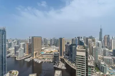 an aerial view of a city with tall buildings at JBR Marina View - 2BR Apartment in Dubai