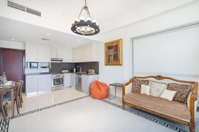 a living room with a couch and a table at JBR Marina View - 2BR Apartment in Dubai