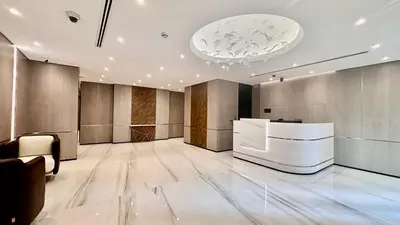 an office with a large room with a reception desk at JBR Marina View - 2BR Apartment in Dubai