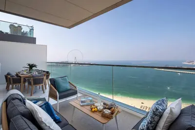a living room with a view of the ocean at Frank Porter - The One JBR in Dubai