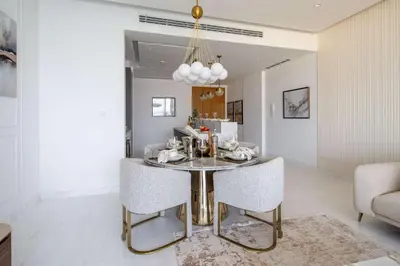 a dining room with a table and chairs at Frank Porter - The One JBR in Dubai