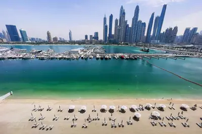 a view of a marina with boats in the water at Marina Vista Private Beach 2BR in Dubai