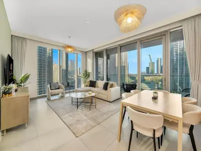 a living room with a couch and a table at Dream Location - Luxury and Comfort in Dubai in Dubai