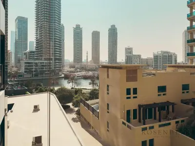 a view of a city skyline with tall buildings at Luxury Canal View Studio at Sparkle Tower in Dubai