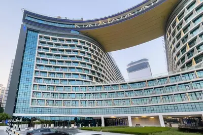a large building with a lot of windows at Seven Palm Residences Palm Jumeirah by Happy Season in Dubai