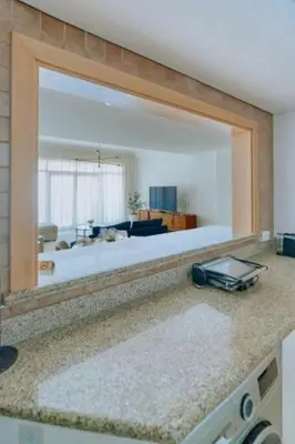 a large mirror on a counter in a living room at Elegant 1BR beach access with Ocean Views, Palm in Dubai