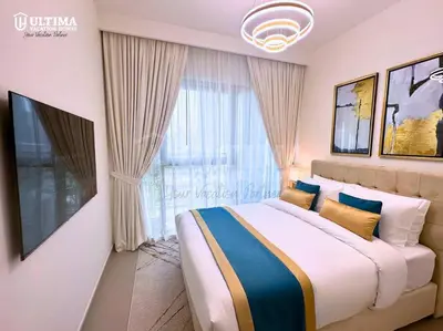 a bedroom with a large bed with a large window at Elegant 2BR Burj Khalifa view-Downtown Views II in Dubai