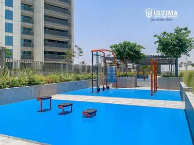 a playground in the middle of a swimming pool at Elegant 2BR Burj Khalifa view-Downtown Views II in Dubai
