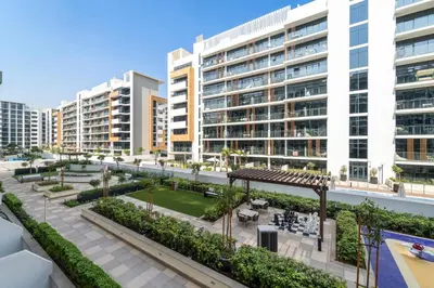 an aerial view of a large apartment complex with buildings at Studio Azizi Riviera 28 Community View in Dubai