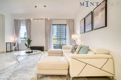 a living room with a couch and a table at Bahar, Jumeirah Beach Residence JBR - Mint Stay in Dubai