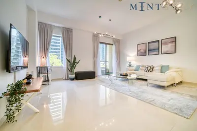 a living room with a couch and a table at Bahar, Jumeirah Beach Residence JBR - Mint Stay in Dubai