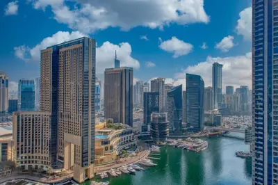 a view of a city with a river and buildings at ShoresInn - Aesthetic Stay with Dubai Marina View in Dubai