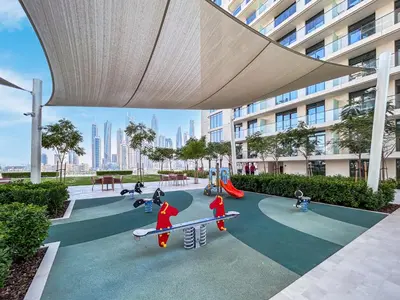 a playground with children on skateboards in a building at Modern Home with Incredible View & Private Beach in Dubai