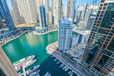 a view of a city with boats in the water at Luxury Apartments - Stunning Marina View - 5-Star Hotel Amenities in Dubai