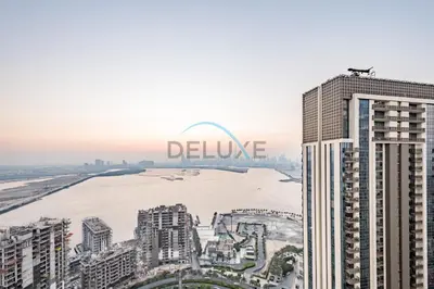 a view of a city with the believe sign on top of a building at Appealing 3BR at 17 Icon Bay Dubai Creek Harbour by Deluxe Holiday Homes in Dubai