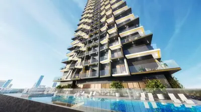 a tall building with a swimming pool in front of it at Modern Luxury Fully Furnished 1BH Apartment in Binghatt Heights JVC - Easy Access to JBR, Circle Mall & Dubai Hills Mall in Dubai