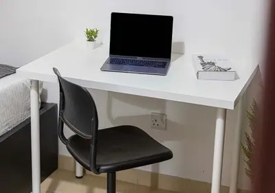 a white desk with a laptop on top of it at 2 min walk to JBR Beach & Dubai Marina - Sea View in Dubai