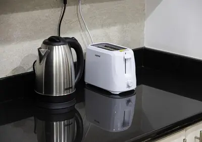 a coffee maker sitting on top of a counter at 2 min walk to JBR Beach & Dubai Marina - Sea View in Dubai