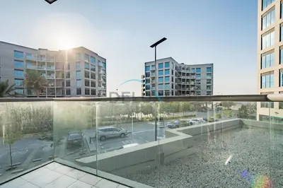 a view of a city from the balcony of a building at Charming 2BR at MAG 515 Dubai South by Deluxe Holiday Homes in Dubai