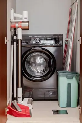 a washer and dryer sitting in a room at Vida Creek Beach 1 Bedroom in Dubai