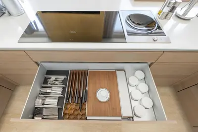 a drawer in a kitchen filled with food at Ultra-Luxury 6BR Palm Villa - Private Pool & Beach in Dubai