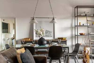 a dining room with a table and chairs at GuestReady - Serene retreat with Ain Dubai Views in Dubai