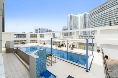 a swimming pool in the middle of a building at Airvistas CityNest Retreat at Business Bay, Dubai in Dubai