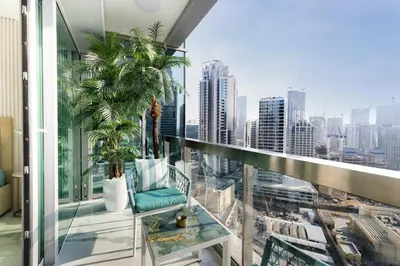 a balcony with a view of a city at Lux apartments x Dubai studio 22 in Dubai