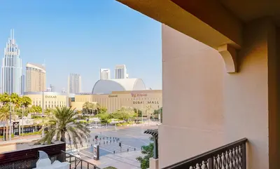 a view of a city from a balcony at Elegant 2BR Apartment in Yansoon 3 with Burj Khalifa Views in Dubai