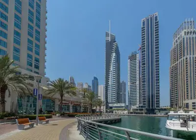 a city with tall buildings and a body of water at Stunning Newly Furnished Apartment Dubai Marina in Dubai