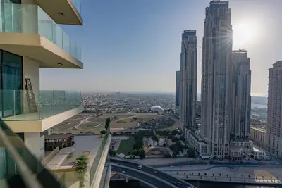 an aerial view of a city with tall buildings at Luxury 1 & 2 BHK Apartments, Branded & State of The Art Amenities in Dubai