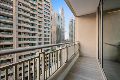 a balcony with a view of some tall buildings at FIRST CLASS 2BR Incredible Burj Khalifa View in Dubai